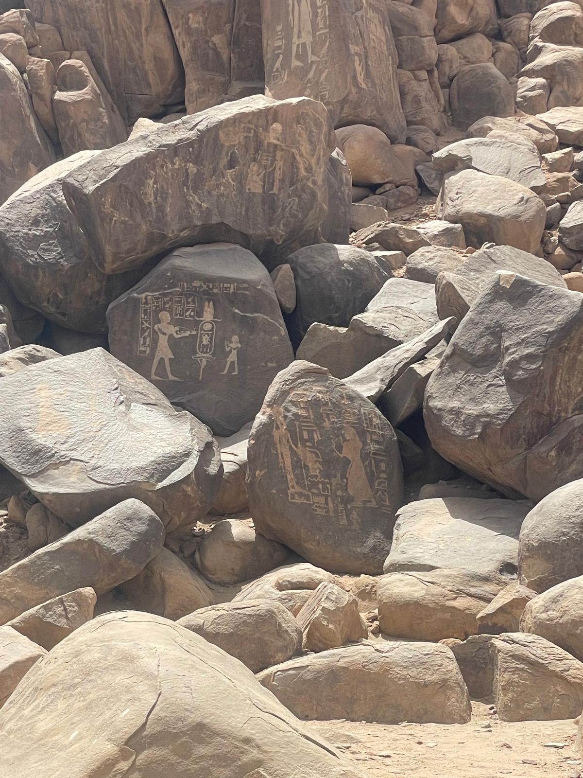 Cartouches scattered across the stones.