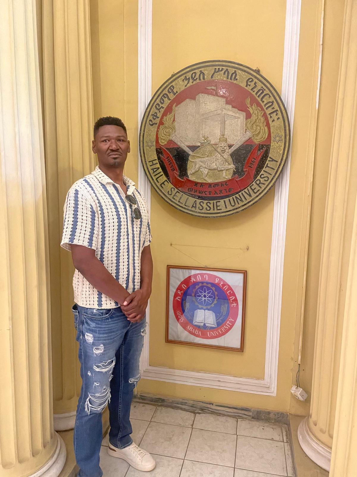 At the seal of Haile Sellassie I University.